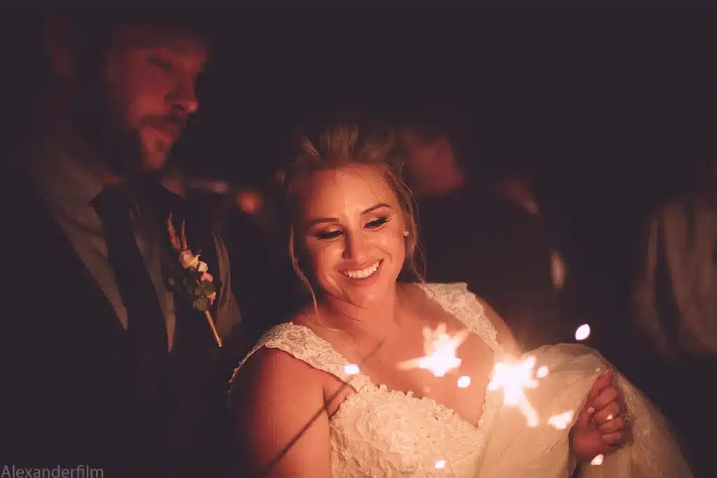 bride playing with sparkler