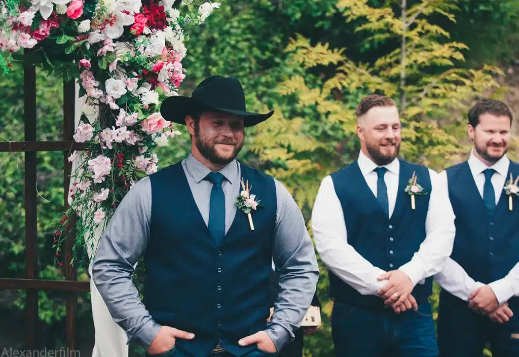 groomsman alls standing at wedding alter