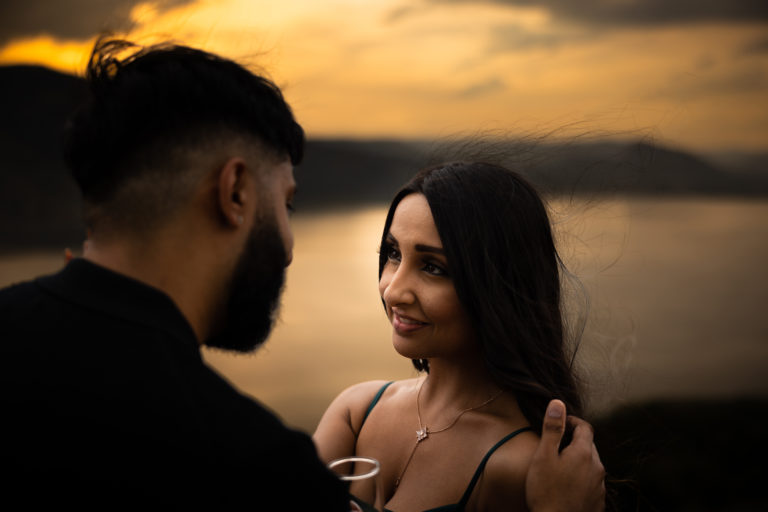 couple looking into each others eyes. view from behind man