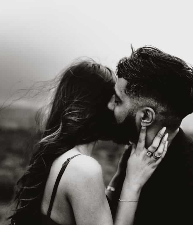 Couple kissing black and white