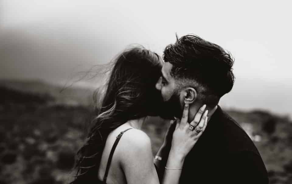 Couple kissing black and white